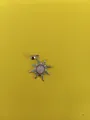 Silver starburst pendant with pink opal center and sparkling zirconia on yellow background - Silver + Pink T004
