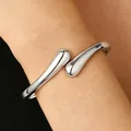 Adjustable silver-tone open bangle bracelet with a polished teardrop design for women - Teardrop Open Style (8856) / Silver
