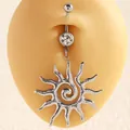 Close-up of stainless steel belly button ring with swirl sun design and clear crystal. - Solar Swirl Pendant / Silver