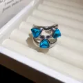 Silver-toned adjustable ring featuring three triangular-cut blue gemstones - Double Layer Wide Triangle Style / Blue