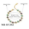 Elegant gold stainless steel flower bracelet with blue pavé rhinestones and size data. - Flower Bracelet (NB-B1392) / 18K Gold / Gold Tone With Blue Rhinestone