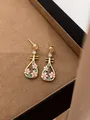 Elegant gold-plated pipa earrings with pink cherry blossoms and blue enamel waves - Enamel Lute Pendant Style