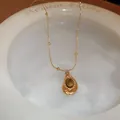 Collar dorado vintage con piedra ojo de tigre en forma de gota y cadena con bolas de oro - 2# Estilo de Gema Dorada Vintage