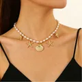 Collana oceano a doppio strato con perle, stelle marine, conchiglia e ciondoli - Stile Pendente Animali Marini Perla Bianca (2015)