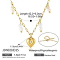 Collar de acero inoxidable dorado con colgante de corazón, cuentas blancas y gema brillante - Collar con Colgante de Corazón de Strass (JDN0203315)