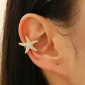 Golden starfish ear cuff with white zircon stones for non-pierced ears shown on model - Full Zirconia Starfish Ear Cuff (7304) / KC Gold