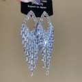 Pendientes largos plateados con circonitas rectangulares y flecos en cascada - Borla de Zirconia Baguette Transparente de Lujo / Plata