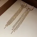 Exquisite lange Quasten-Ohrringe mit Schleife in Gold und funkelnden Kristallen - Schleife Diamantkette Quaste Stil (32#)