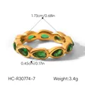 Detailed macro shot of gold stainless steel ring with green teardrop stones and measurements. - Size 7 / Pear Cut Style (HC-R30774-7)