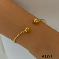 Elegant minimalist gold plated stainless steel open bangle bracelet with bead ends for women - Double Round Bead Style (A1291) / Gold