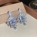 Close-up of sparkling floral chandelier earrings with square cubic zirconia detail - Baroque Rectangle Dangle (46#)