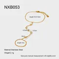 Macro detail of gold-plated stainless steel hand chain with zircon dimensions and specs - NXB053