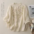 Ethnic style cotton linen shirt with floral embroidery and button-up front in beige - M / Apricot