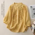 Camicia in lino giallo chiaro con ricami floreali e maniche a lanterna - M / Giallo