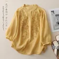 Light yellow linen shirt with floral embroidery and classic lantern sleeves - M / Yellow