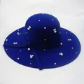 Close-up of royal blue wool felt wide brim hat with white pearls and gold bead details - Royal Blue