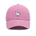 Detailed close-up of pink washed cotton baseball cap with white silly goose embroidery - One Size / Pink