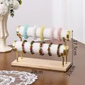 Two-tier gold jewelry stand with white velvet bars and wood base for bracelet display - Double Layer / White Leather