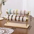 Two-tier gray velvet jewelry stand with gold metal frame and solid wood base - Double Layer / Beige Velvet