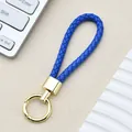 Portachiavi in pelle PU intrecciata blu con chiusura in metallo dorato per auto - Fibbia Intrecciata con Anello a Molla / Blu Reale