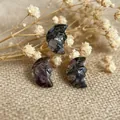 Hand-carved natural stone moon pendant with face relief in dark grey purple crystal - Blue Flash Stone