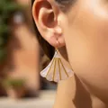 Elegant pink resin ginkgo leaf earrings with golden lines worn by a model in soft light - Pale Pink Fan-Shaped Ginkgo Leaf Earrings (8456)