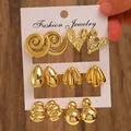 Golden C-shaped earring set with six pairs of geometric styles on a white card - 6-Pair Gold Geometric Mix Earrings Set / Gold (6887)