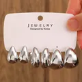 Three-pair set of silver-polished retro C-shaped hoop earrings on a display card - 3-Pair Silver Teardrop Polished Earrings Set / Silver (5840)