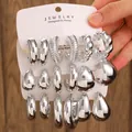 Silver vintage C-shaped hoop earrings set with varied textured and polished designs - 18-Pair Silver Geometric Mixed Earrings Set / Silver (3 Cards)
