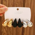 Three-pair teardrop earring set in gold, matte black, and silver finish on display card - 3-Pair Teardrop Earrings Set / Gold + Matte Black + Silver (10886)