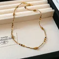 Collana di perle di vetro dorate fatte a mano con accenti occhio di tigre per look elegante - 40# Collana-Oro-Marrone