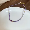 Elegante collana di perle di vetro viola con accenti dorati in acciaio inossidabile da donna - Collana N. 56 - Viola