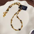 Collana di perle elegante in acciaio inossidabile con perle di vetro marrone e oro - 60# Oro-Caffè