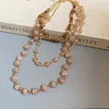 Elegante collana a più strati con perle di vetro ambrate e catena in acciaio inossidabile. - Collana #61 - Oro - Marrone