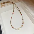 Elegante collana di perle e pietre naturali su una catena in acciaio inossidabile durevole - Collana Perlata Materiali Misti (HN9528) / Perla d'Acqua Dolce 4mm / Marrone oro