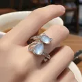 Silver cat paw open ring with light blue moonstone and sparkling cubic zirconia - Cat Ear Faux Moonstone Style (8282)