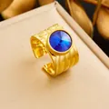 Vintage 18K gold plated stainless steel ring with a large blue faceted gemstone - Adjustable Open