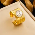 Adjustable 18K gold-plated ring featuring a wide hammered band and a large clear crystal - Adjustable Open