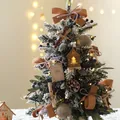 Mini lighted Christmas tree with pine cones, berries, and wooden house on a desk - Golden House Style 45cm
