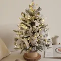 Mini flocked Christmas tree with star topper, white ornaments, lace bow, and LED lights - Winter Story 45cm