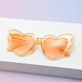 Sparkly heart shaped sunglasses in translucent orange finish with gold glitter accents - C5