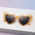 Amber heart-shaped sunglasses with gold glitter finish and dark grey lenses - Amber Glitter Frame (C22)