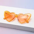 Translucent amber heart-shaped sunglasses with a vintage party aesthetic and UV400 lenses - Amber Transparent Frame (C8)