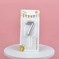 Metallic silver number 7 birthday cake candle presented in a decorative retail card - Silver Number 7 Candle