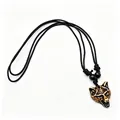 Close-up detail of wolf head resin pendant featuring realistic imitation bone carving - Red Brown