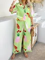 Two-piece bohemian set featuring green tropical print shirt and high-waist wide-leg pants - Green Fruit Floral