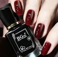 Deep wine red nail polish in a 14ml square bottle with high gloss finish manicure - 16 Cherry Wine Red