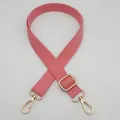 Detailed view of adjustable pink woven canvas strap with gold-tone metal lobster clasps - Silver Hook / Watermelon Pink