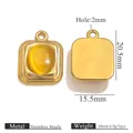 Macro view of oval stainless steel pendant with yellow gemstone insert showing dimensions - Gold Rectangle Pendant - Yellow Cat's Eye