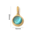 Detail view of gold oval stone pendant with 30mm height and 16mm width dimensions - Gold Round Pendant - Blue Cat's Eye Stone